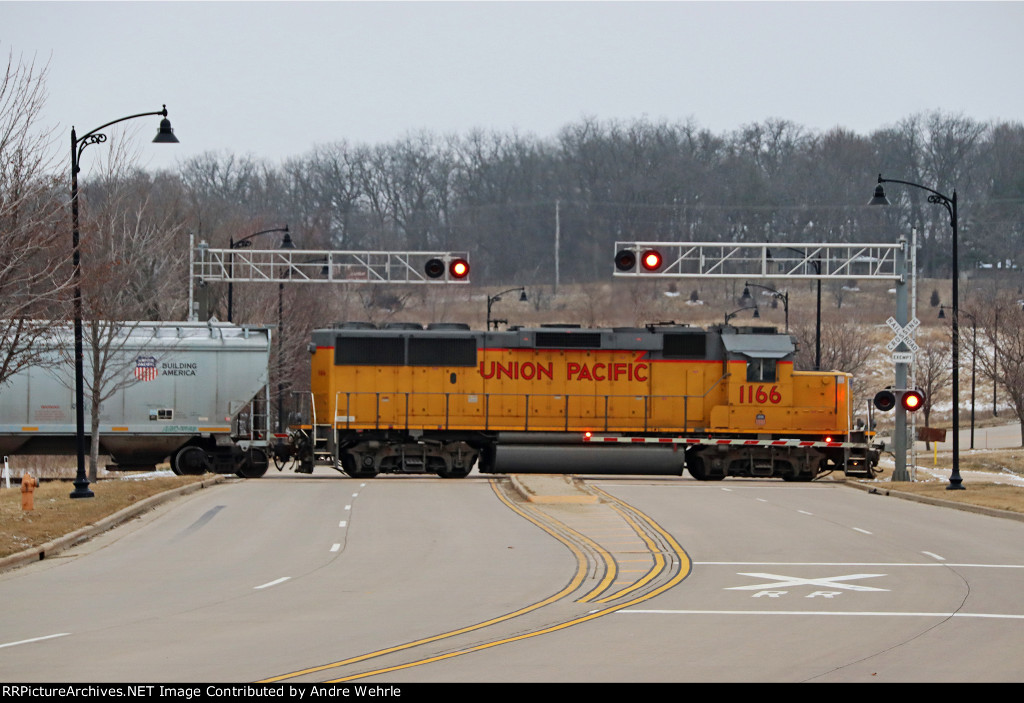 Crossing Gateway Boulevard, back on "home" rails